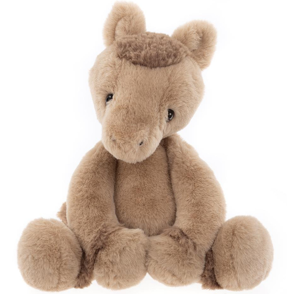 Plush pony toy on a white background