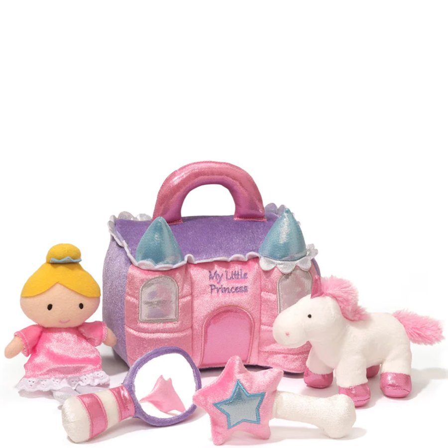 Pink princess toy set with castle, doll, unicorn, and accessories on a white background