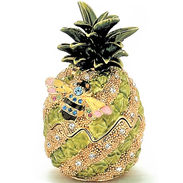 Decorative pineapple figurine with a bee and crystals on a white background