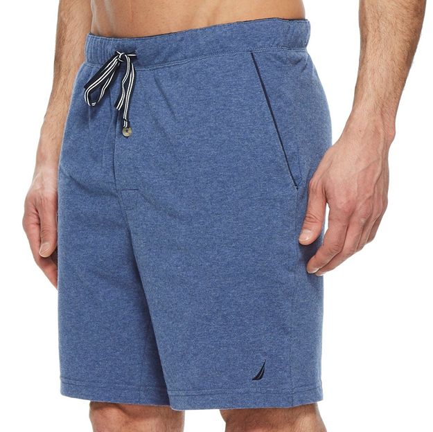 Blue shorts with a drawstring on a white background