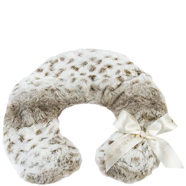 Fluffy neck pillow with a white ribbon on a white background