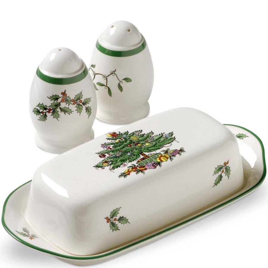 Set of Christmas-themed ceramic butter dish, salt and pepper shakers on a white background