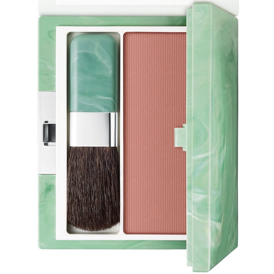 Makeup brush and blush in a green marbled case on a white background