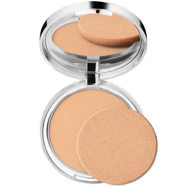Compact powder in a silver case with a clear lid on a white background
