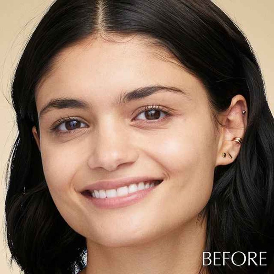 A woman's face showing before and after use of makeup.