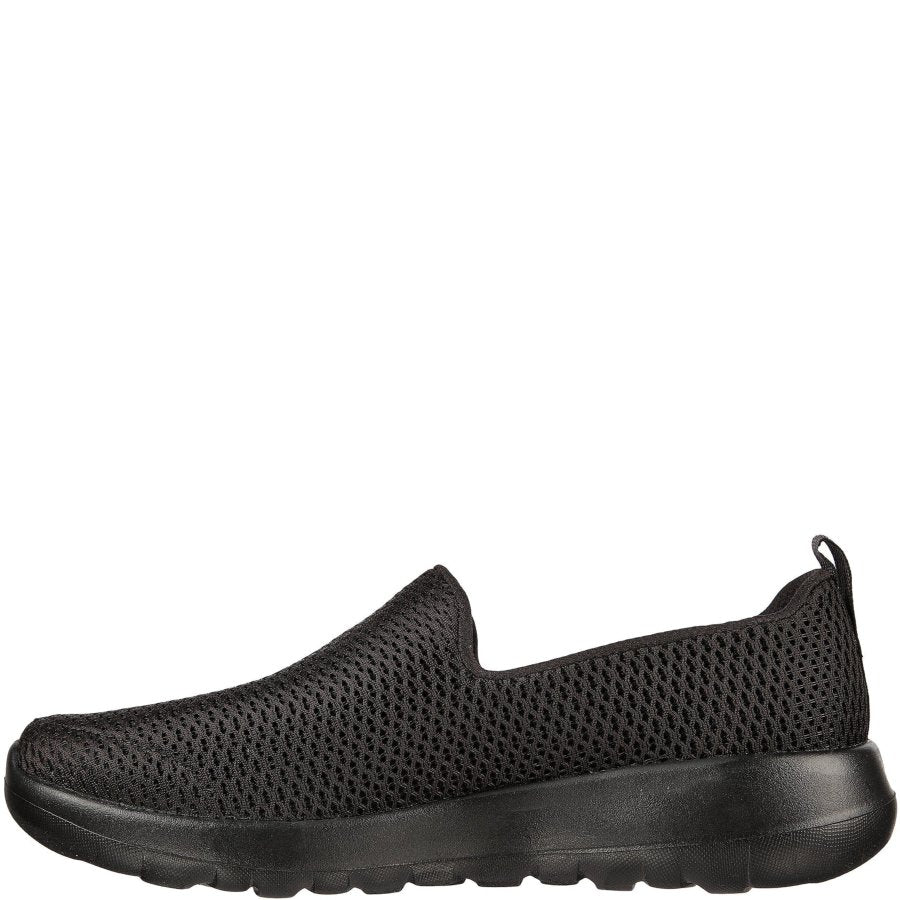 Black slip-on sneaker on a white background