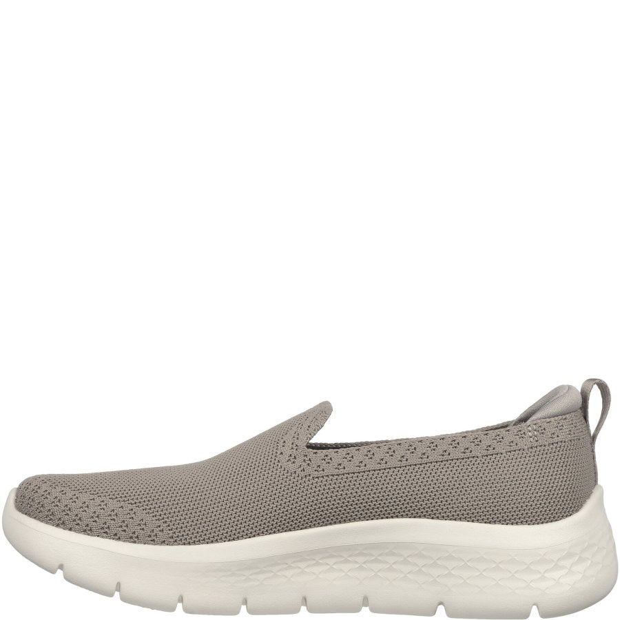 Gray slip-on shoe with white sole on a white background