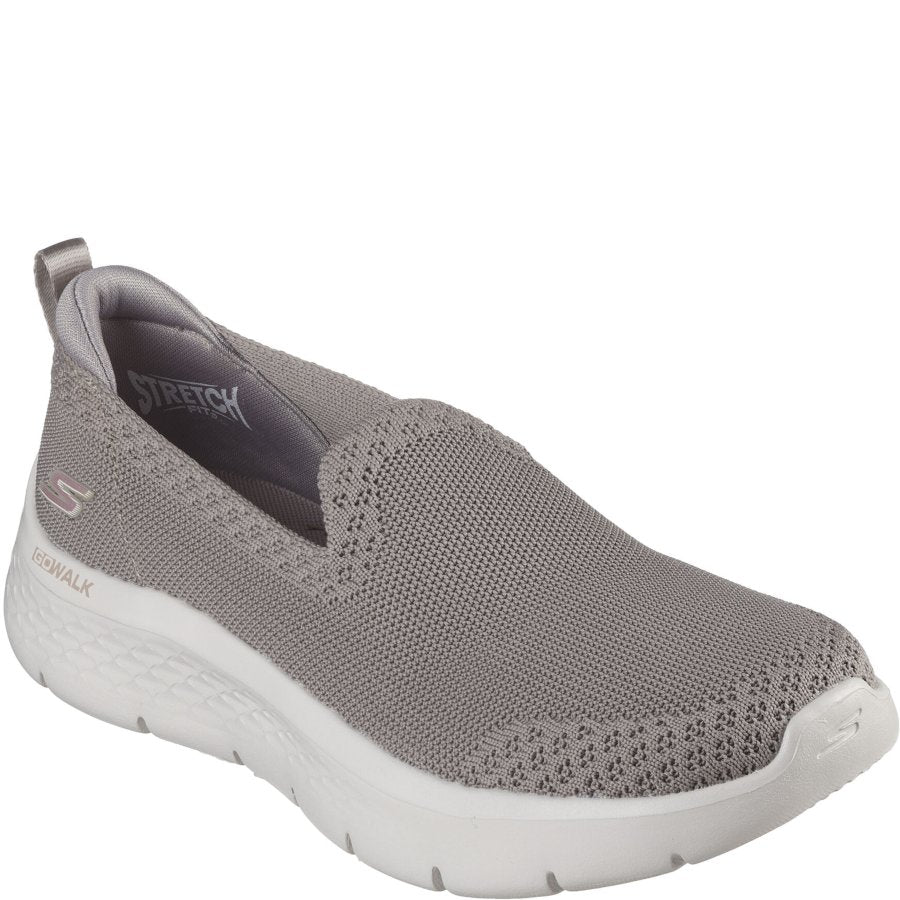 Gray slip-on shoe with 'Skechers' branding on a white background