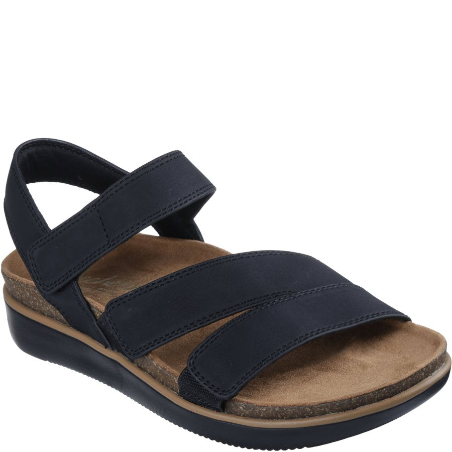 Navy blue sandal with a brown sole on a white background