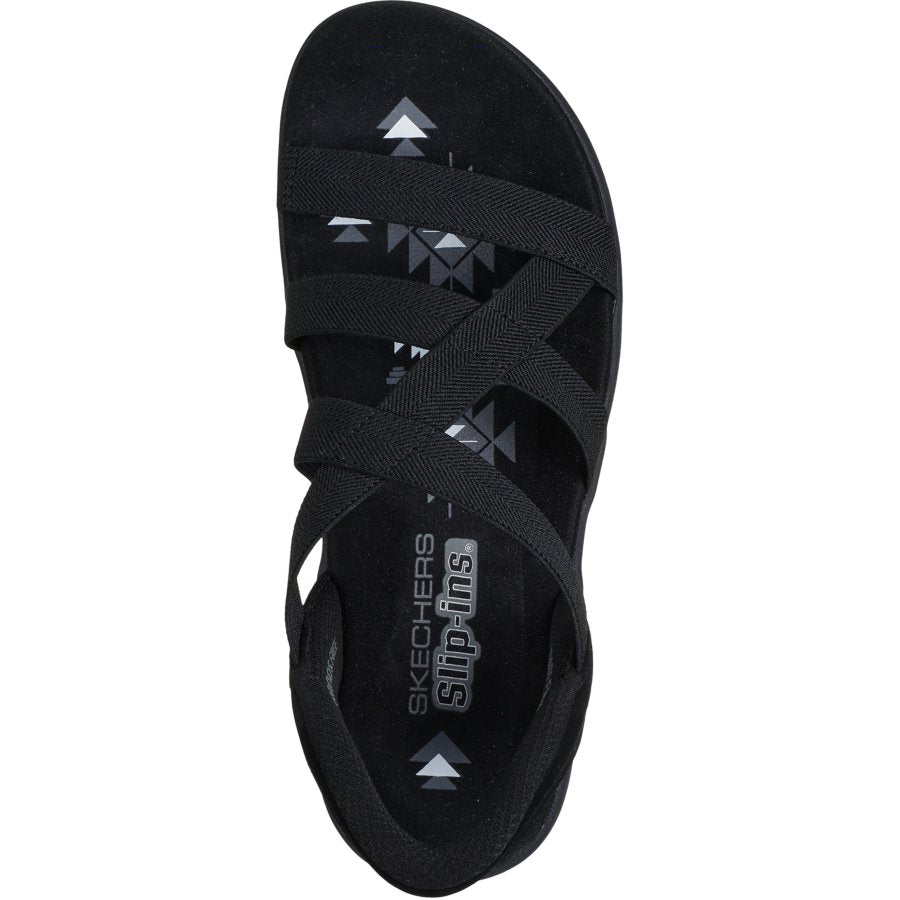 Black sandal with strap design on a white background