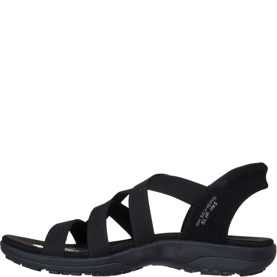 Black sandal with criss-cross straps on a white background