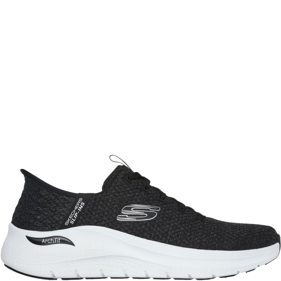 Black sneaker with white sole on a white background