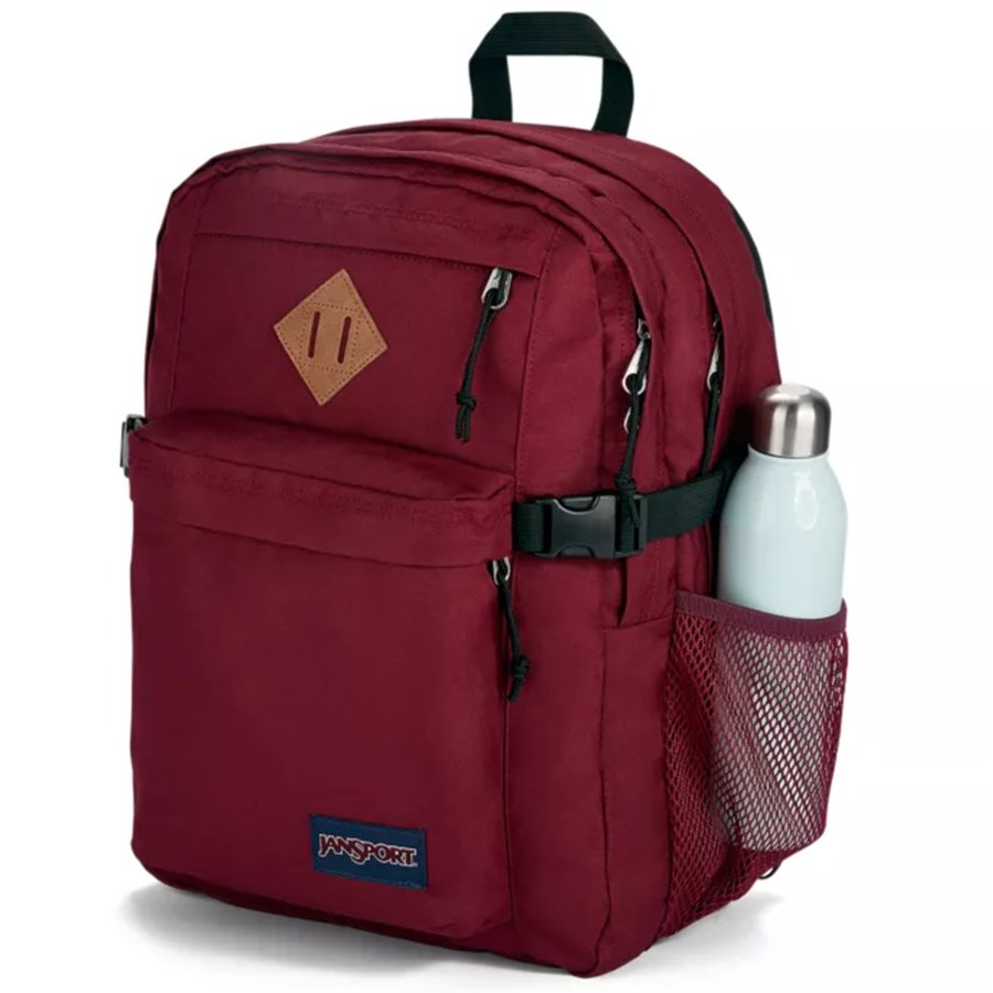 Maroon Jansport backpack with a water bottle on a white background