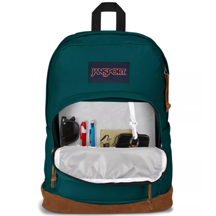 Green Jansport backpack with brown bottom section, open to show contents, on a white background