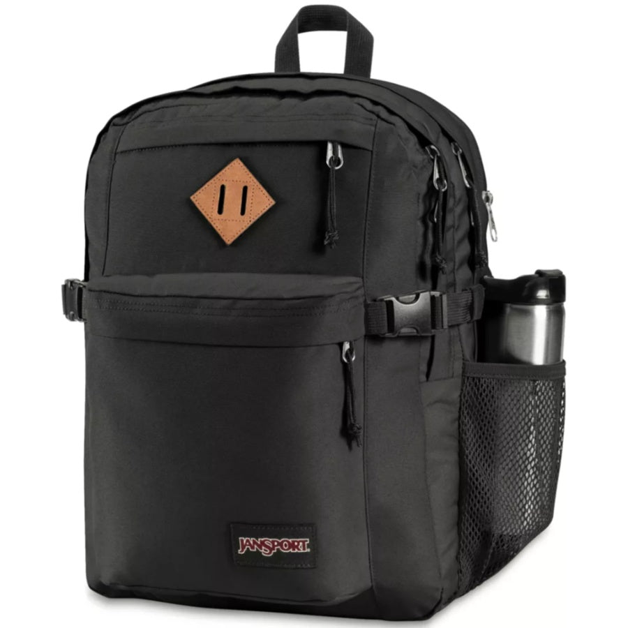 Black backpack with a brown patch and JanSport logo on a white background