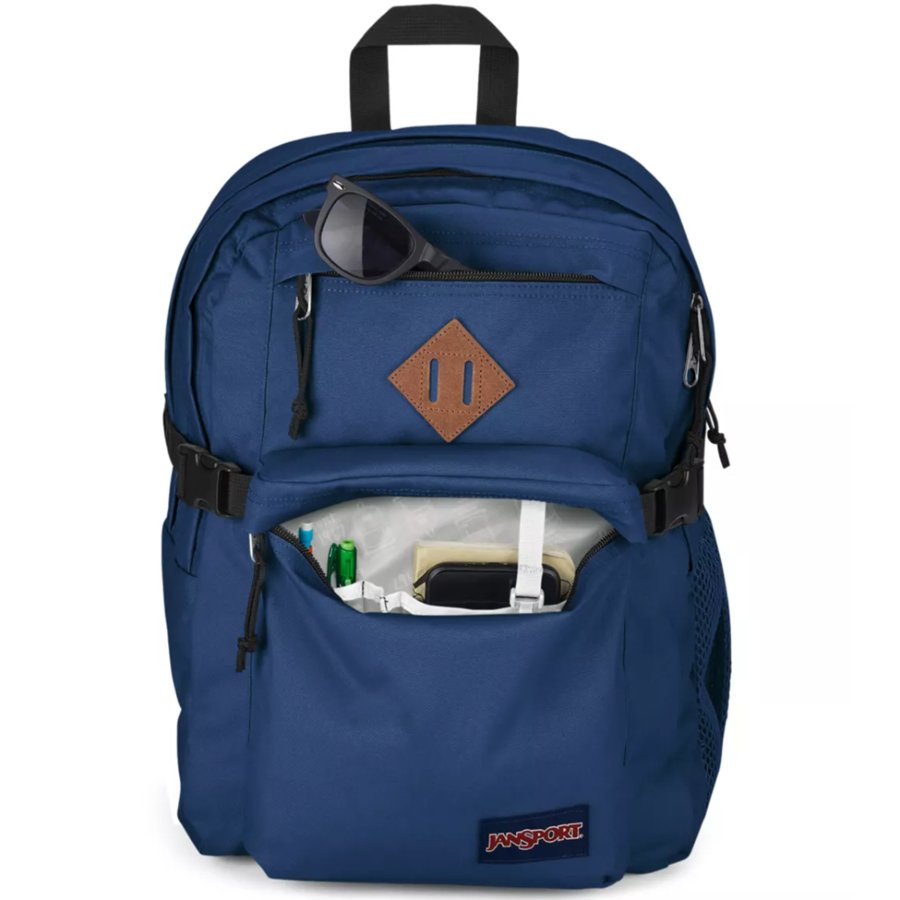 Blue Jansport backpack with a brown logo on a white background