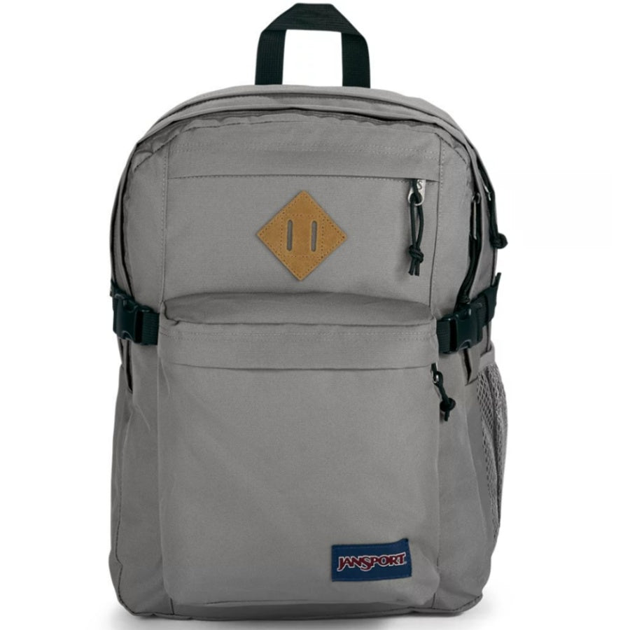 Gray Jansport backpack with a yellow logo and Jansport logo on a white background
