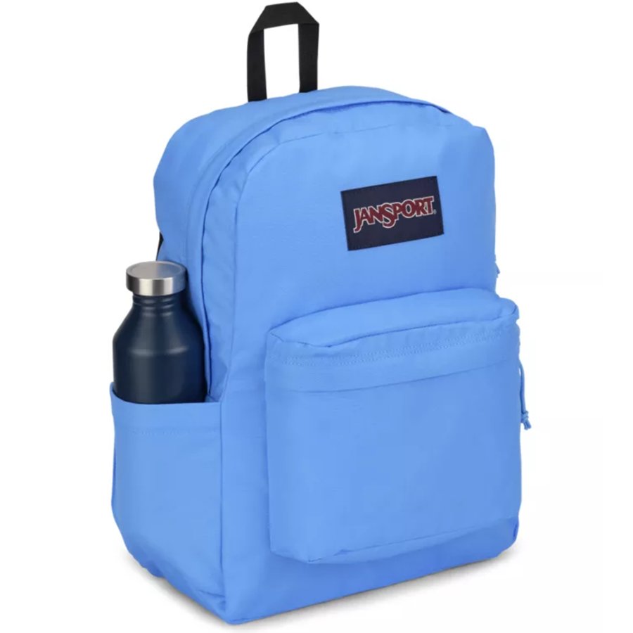Blue Jansport backpack with a water bottle in front pocket on a white background