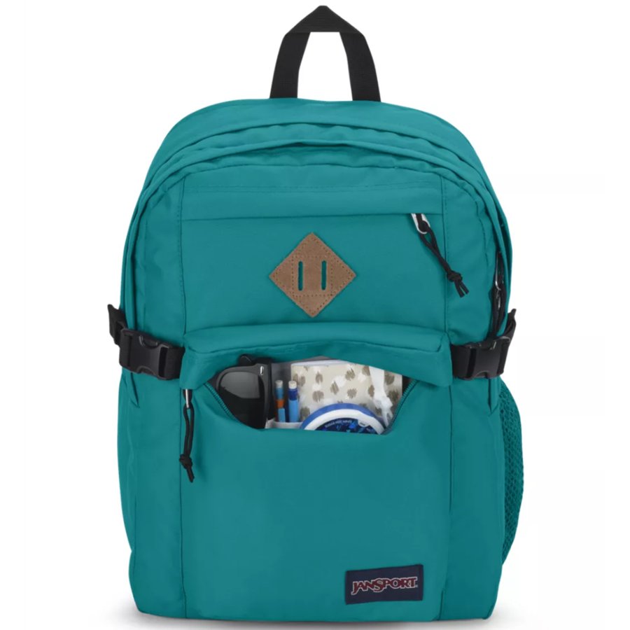 Teal Jansport backpack with a brand logo on a white background