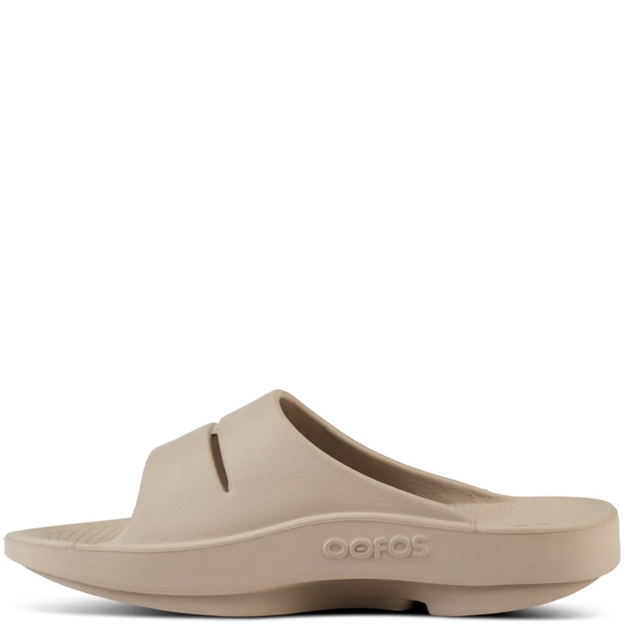 Beige sandal with 'Oofos' branding on a white background