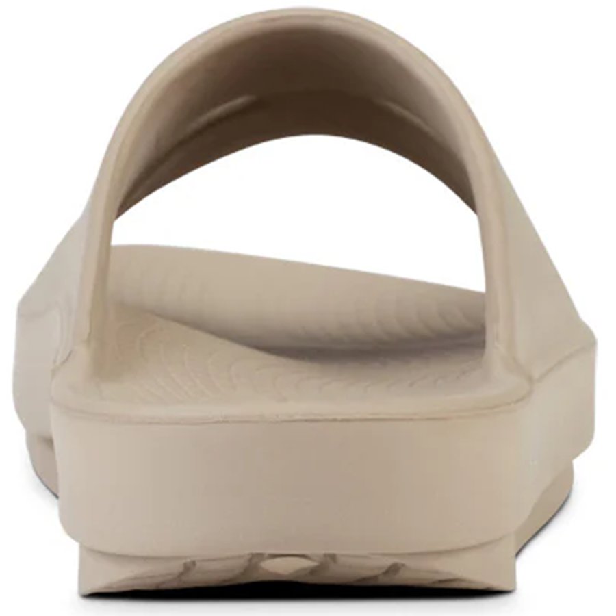 Beige sandal on a white background