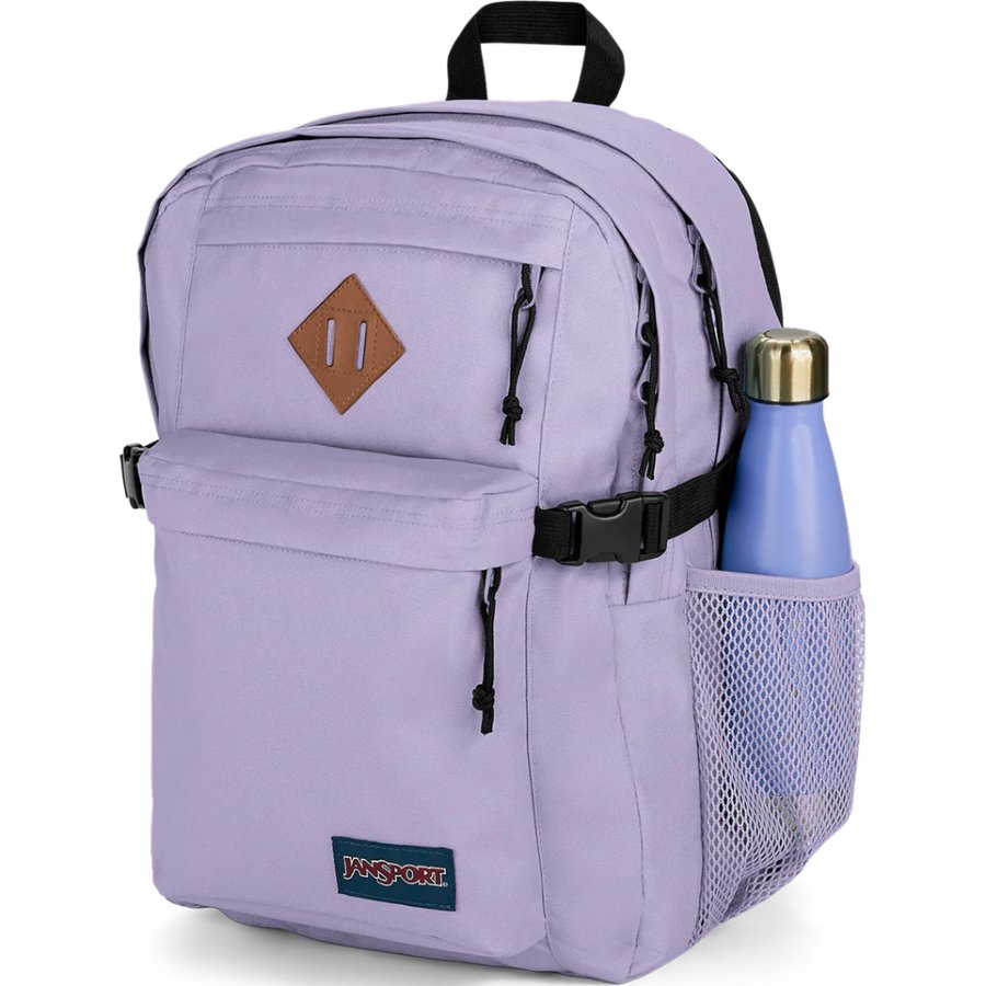 Purple Jansport backpack with a water bottle in a pocket on a white background