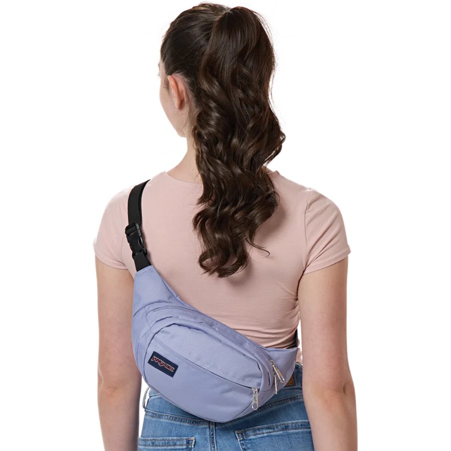 Person wearing a purple sling bag on a white background