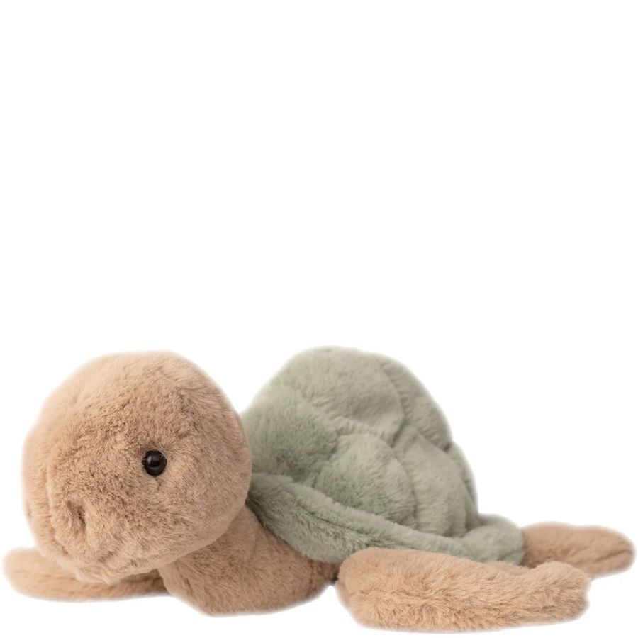 Plush turtle toy with beige shell and green body on a white background