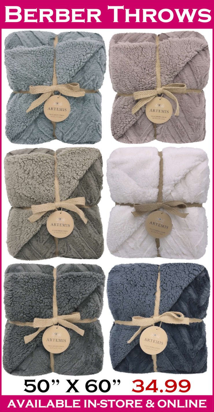 Collection of Berber throws in various colors with a price tag displayed.
