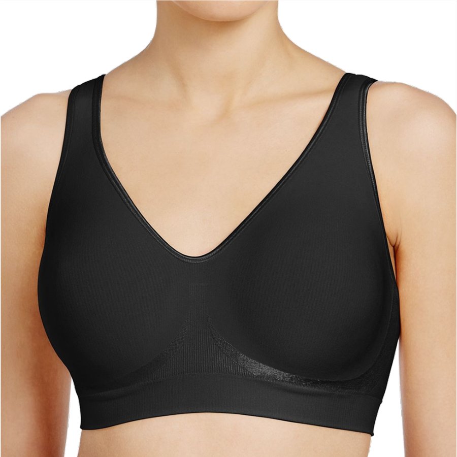 Black sports bra worn by a person on a white background