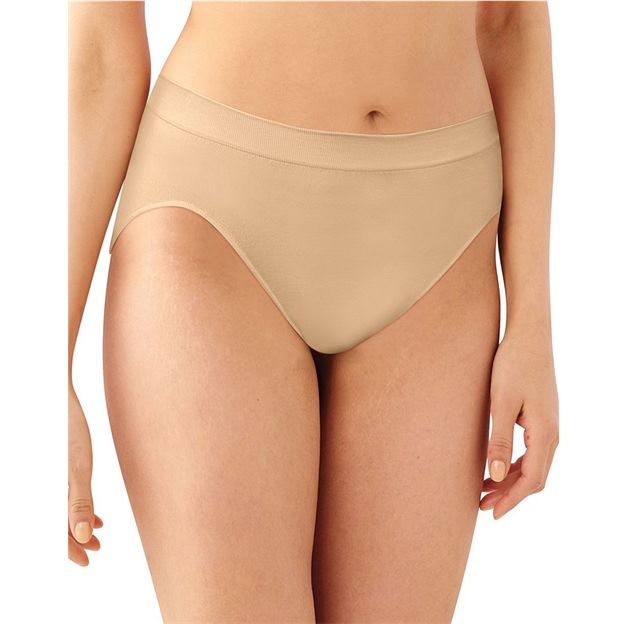 Beige underwear worn by a person on a white background