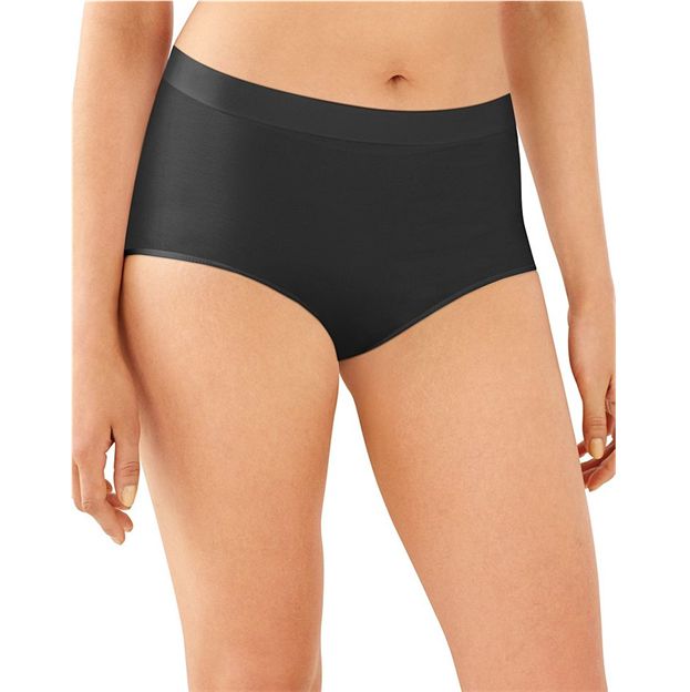 Black underwear worn by a person on a white background