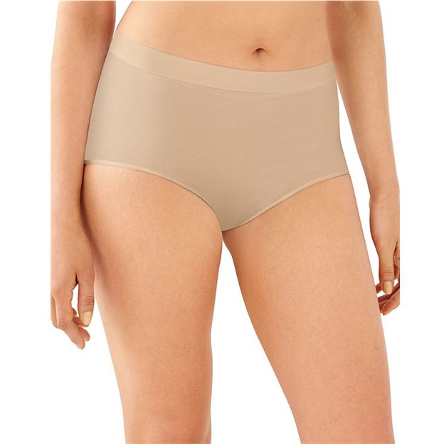 Beige underwear worn by a person on a white background