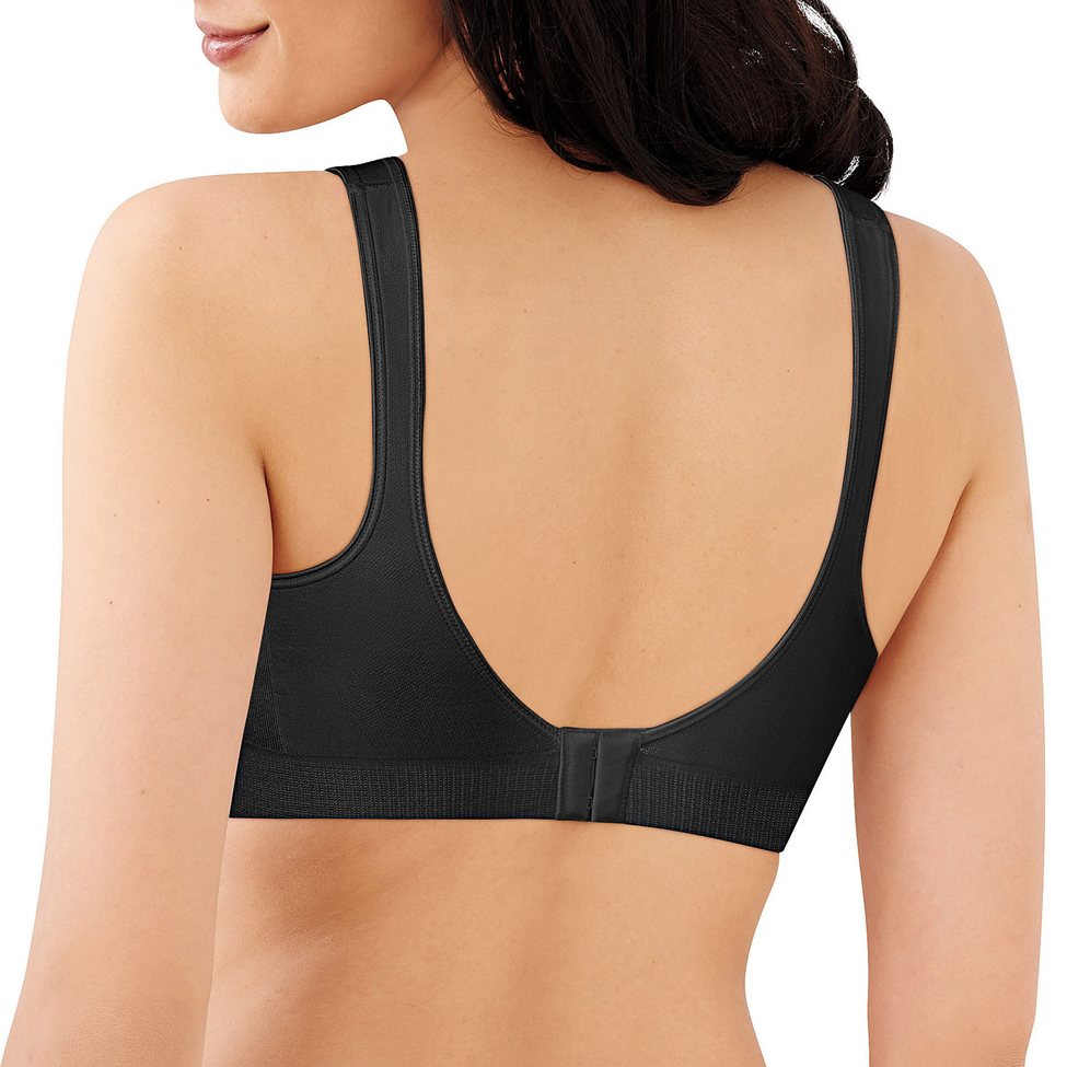 Black bra worn by a model on a white background