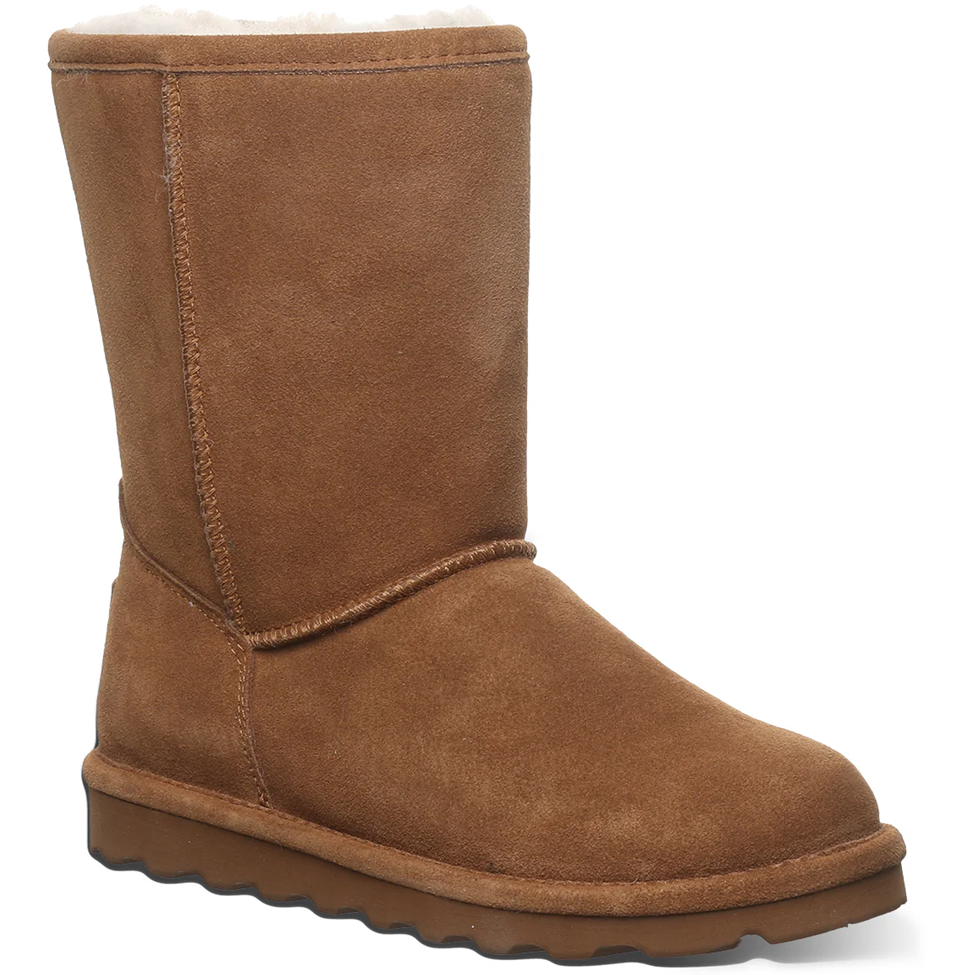 Brown suede boot on a white background