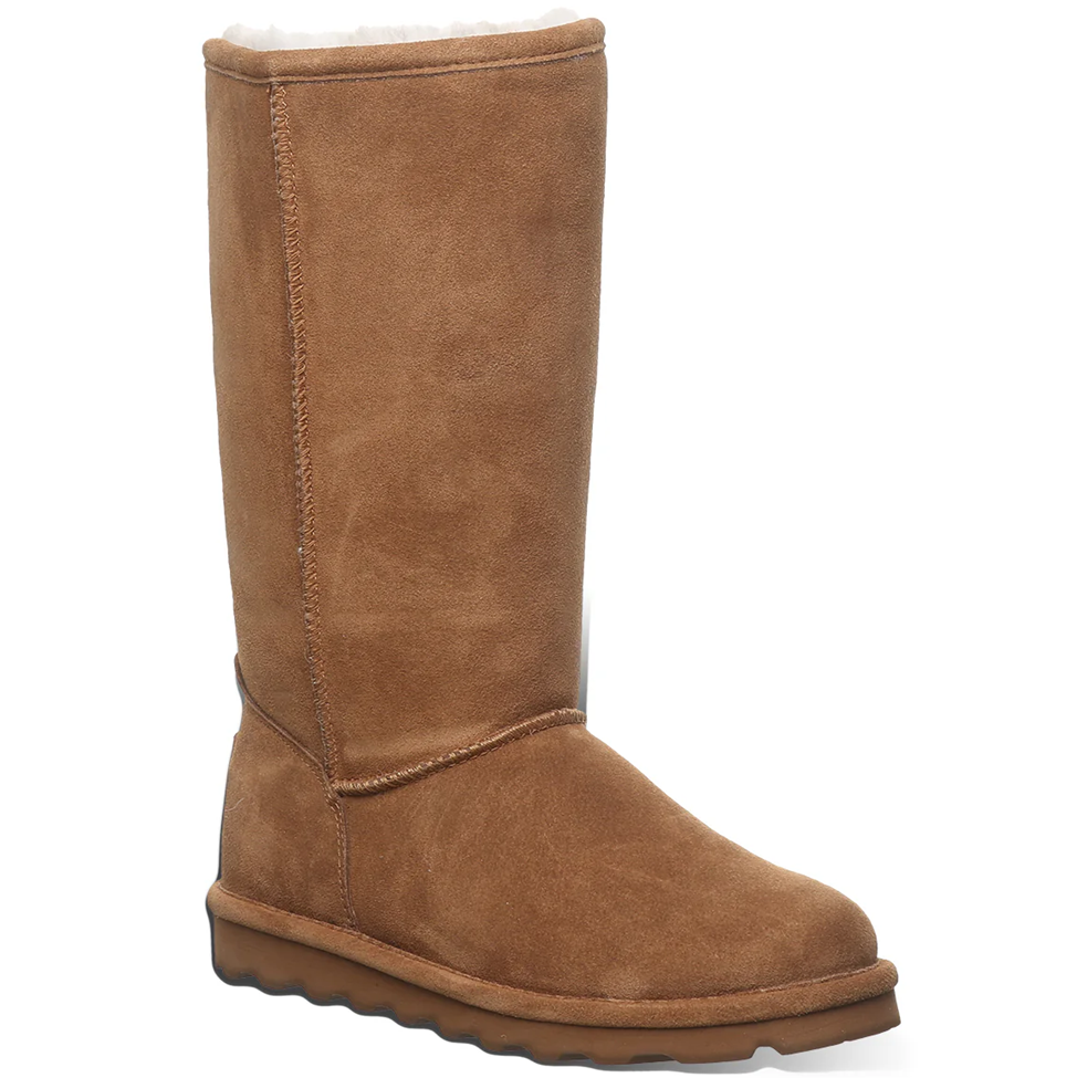 Brown suede boot on a white background