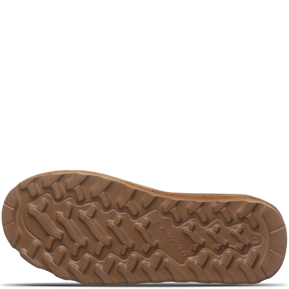 Brown shoe sole with tread pattern on a white background
