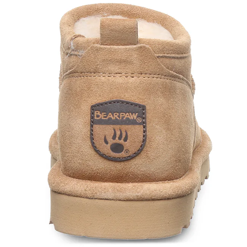 Tan suede shoe with Bearpaw logo on a white background