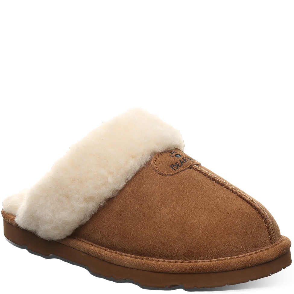 Brown slipper with white fur lining on a white background