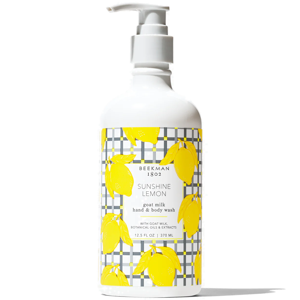 Beekman 1802 Sunshine Lemon goat milk hand and body wash bottle on a white background