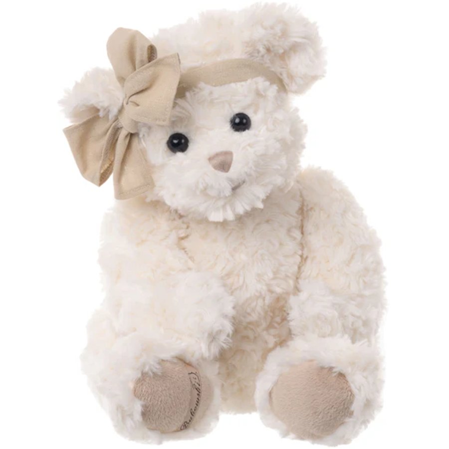 White teddy bear with a beige bow on a white background