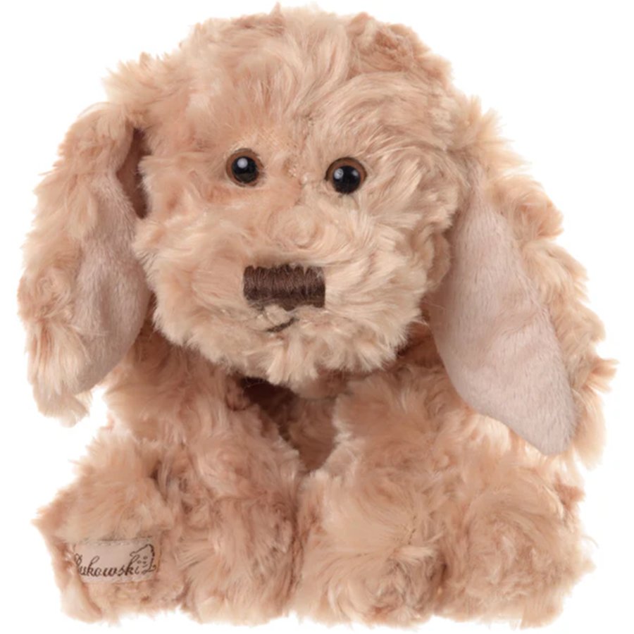 Plush toy dog on a white background