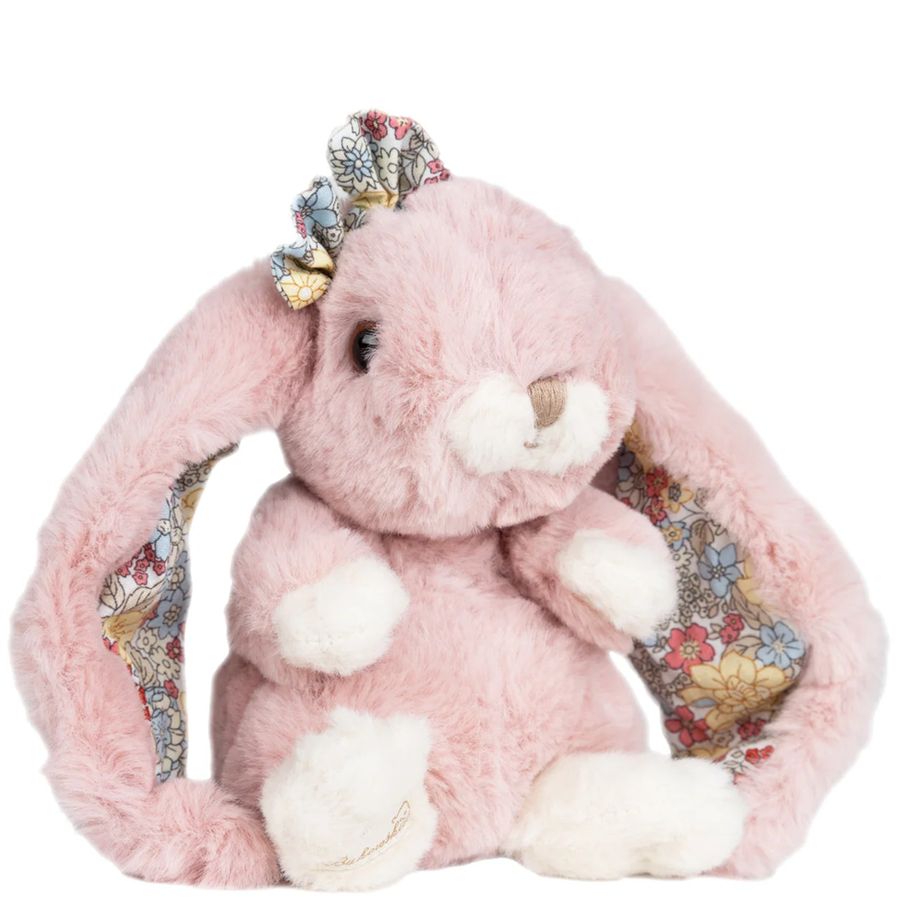 Pink plush bunny with floral details on a white background