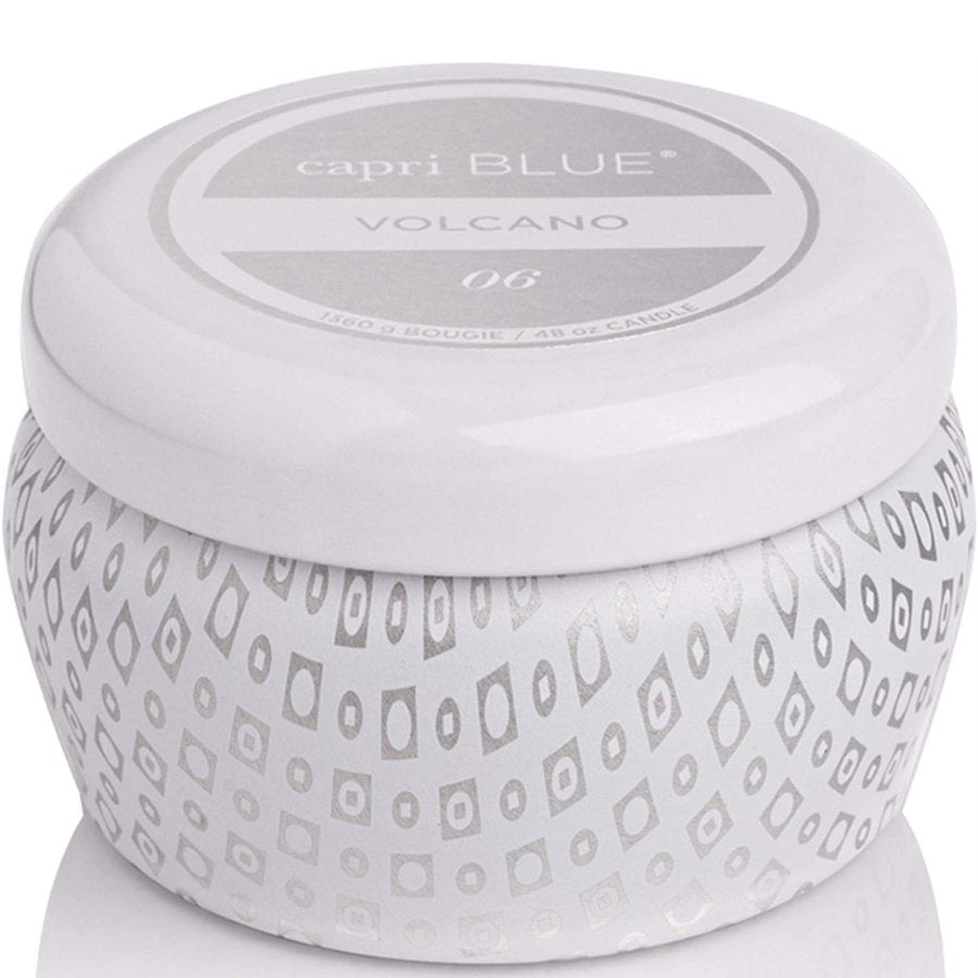 Capri Blue candle with patterned design and 'Volcano' label on a white background