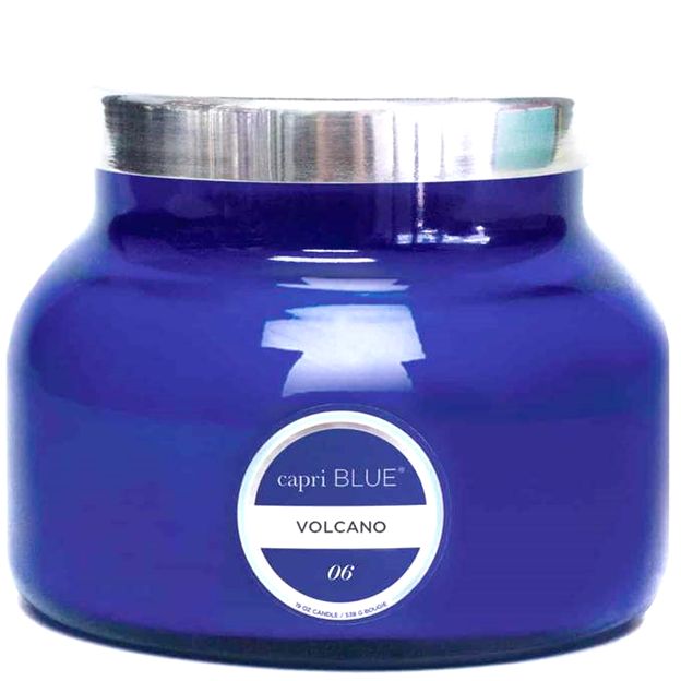 Blue candle jar with silver lid and 'capri BLUE' label on a white background