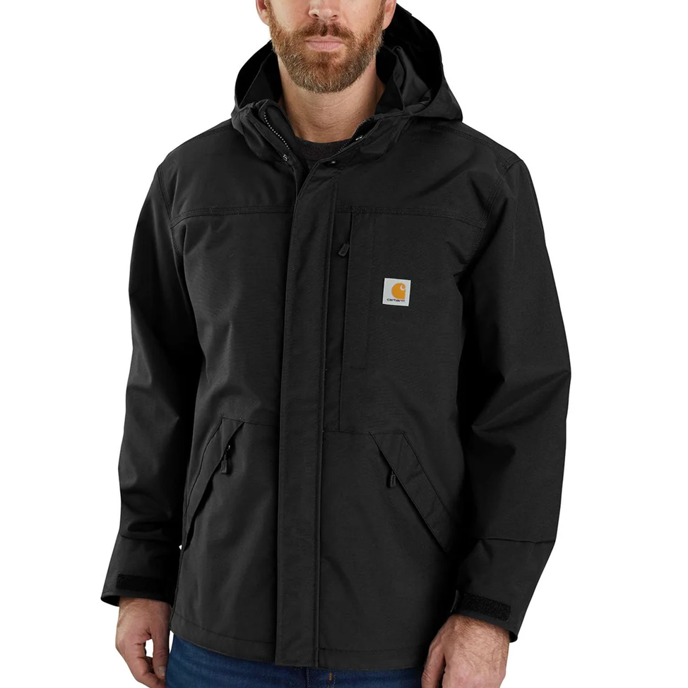 Man wearing a black jacket with a visible brand logo on a white background