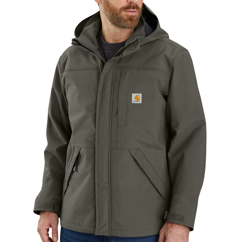 Man wearing a Carhartt jacket on a white background