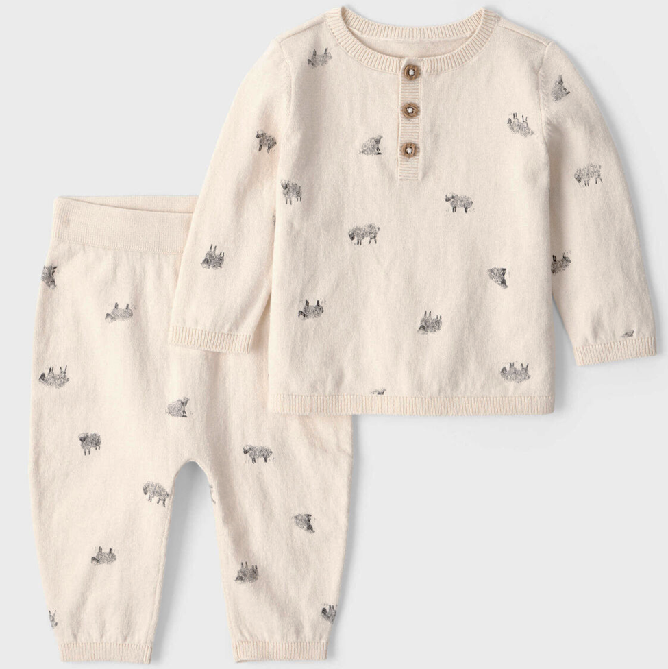 Beige baby outfit with long-sleeve top and pants featuring small patterns on a light gray background
