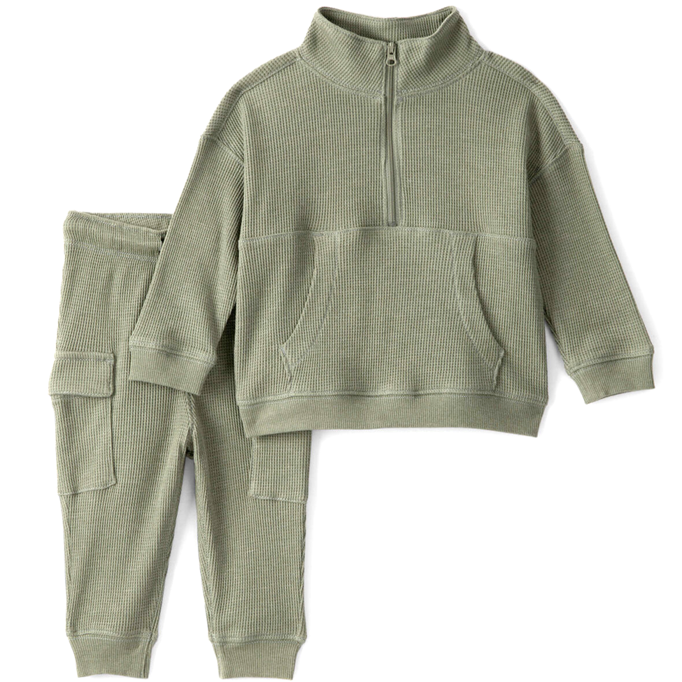 Green waffle-textured sweatshirt and pants set on a white background