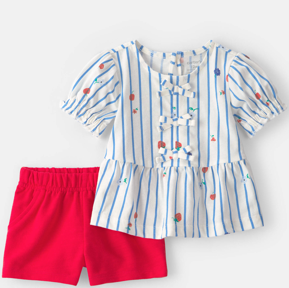 Striped shirt with floral details and red shorts on a white background